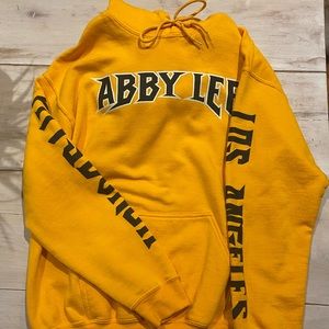 Abby Lee yellow hoodie